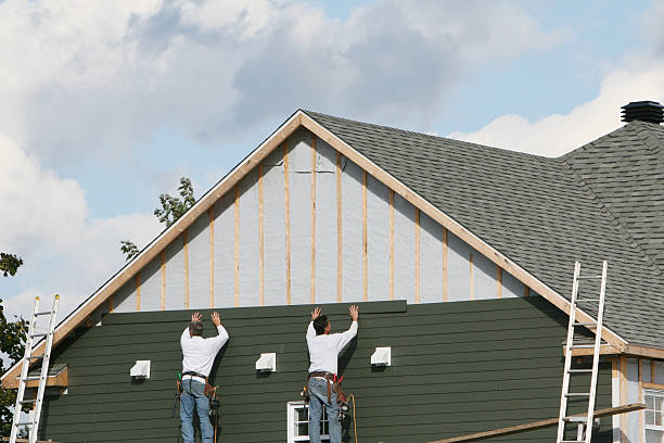 Professional Siding Contractor technician working in Amston, CT